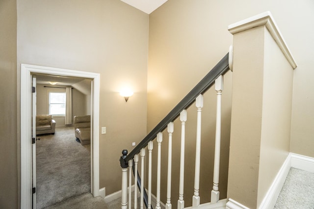 11474 Laketowne Dr, Albertville, MN 55301 - stairway featuring carpet flooring, baseboards, and a high ceiling