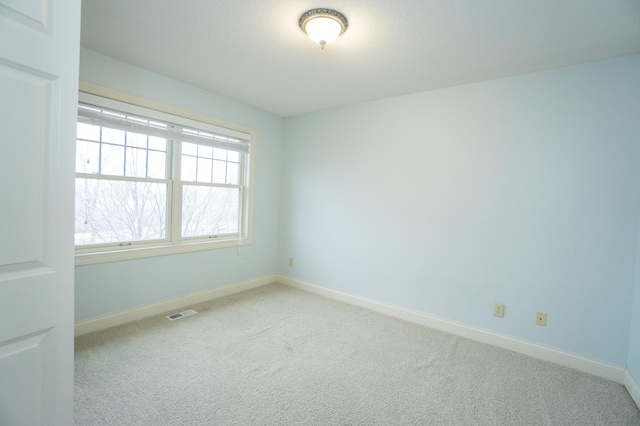 11474 Laketowne Dr, Albertville, MN 55301 - carpeted empty room with baseboards