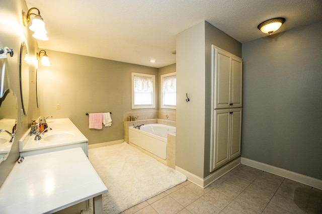 11474 Laketowne Dr, Albertville, MN 55301 - full bathroom with double vanity, a bath, tile patterned floors, and baseboards
