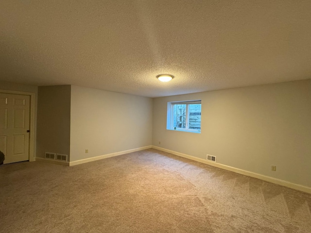 11474 Laketowne Dr, Albertville, MN 55301 - spare room with carpet floors, baseboards, and a textured ceiling