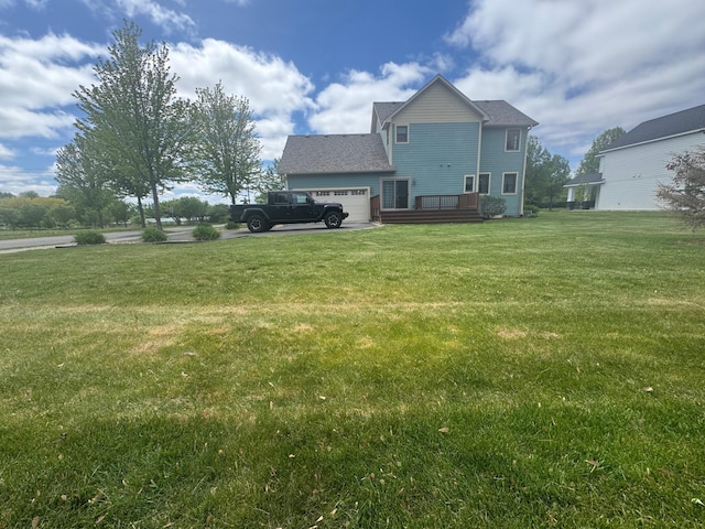 11474 Laketowne Dr, Albertville, MN 55301 - view of side of property with a garage, a lawn, and a wooden deck