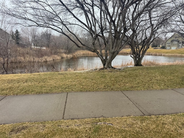 11474 Laketowne Dr, Albertville, MN 55301 - view of green lawn featuring a water view