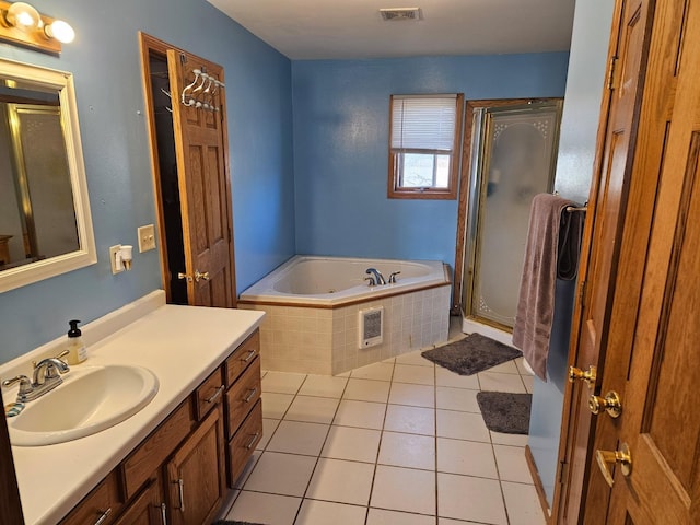 full bathroom with a bath, visible vents, tile patterned floors, and a stall shower