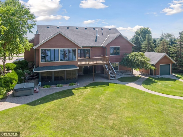 back of property featuring stairway, roof with shingles, a lawn, a wooden deck, and a patio area