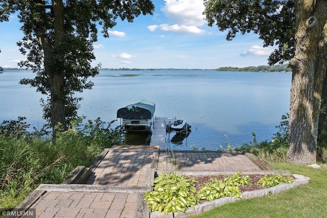 view of dock with a water view and boat lift