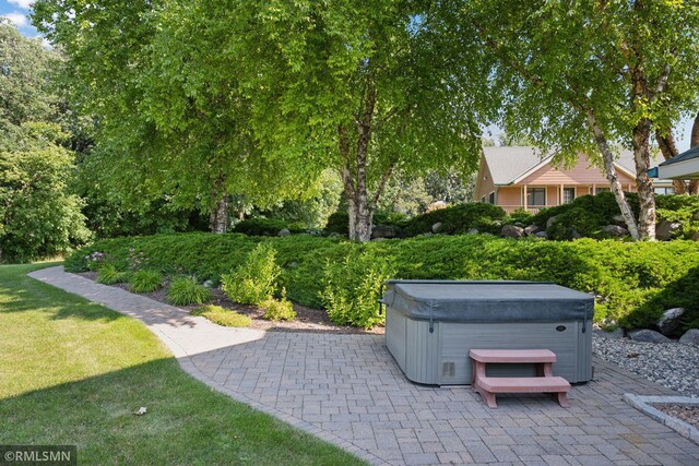 view of patio with a hot tub