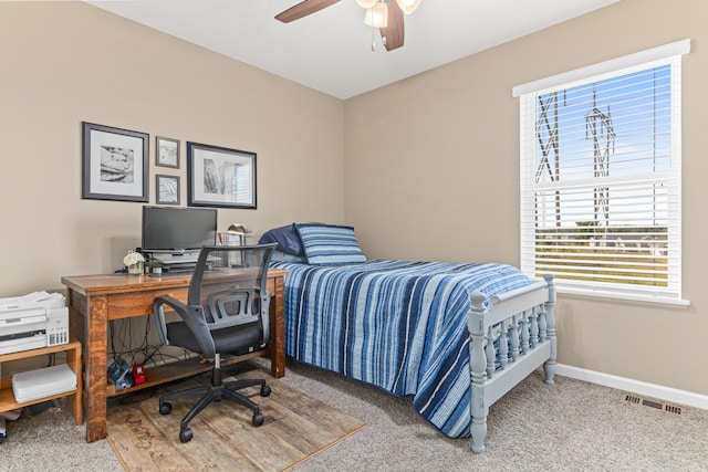 10120 189th Ave NW, Elk River, MN 55330 - carpeted bedroom with baseboards, an office area, and ceiling fan