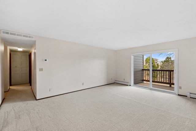 450 Ford Rd Unit 225, Saint Louis Park, MN 55426 - empty room featuring light colored carpet and a baseboard radiator