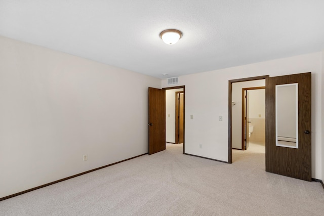 450 Ford Rd Unit 225, Saint Louis Park, MN 55426 - unfurnished bedroom with light carpet and baseboards