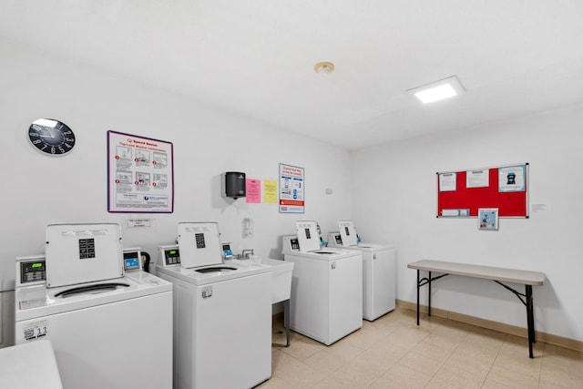 450 Ford Rd Unit 225, Saint Louis Park, MN 55426 - shared laundry room with separate washer and dryer and baseboards