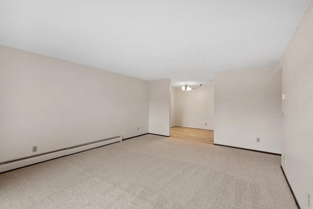 450 Ford Rd Unit 225, Saint Louis Park, MN 55426 - unfurnished room featuring carpet floors and baseboard heating