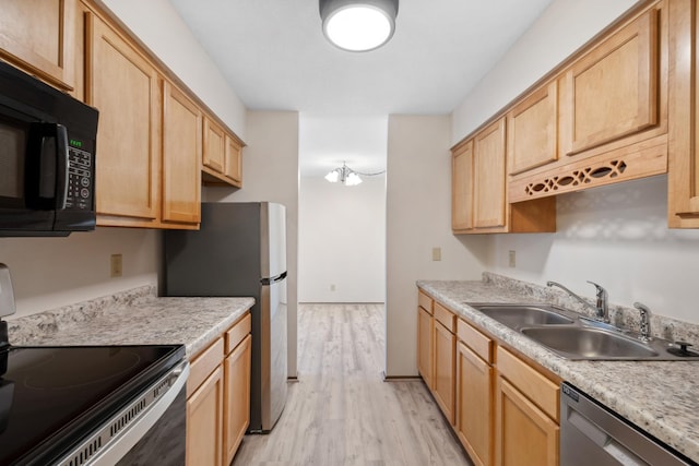 450 Ford Rd Unit 225, Saint Louis Park, MN 55426 - kitchen featuring stainless steel appliances, light wood-type flooring, light brown cabinetry, and light countertops