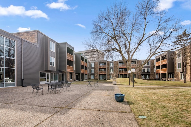 450 Ford Rd Unit 225, Saint Louis Park, MN 55426 - view of home's community featuring a lawn