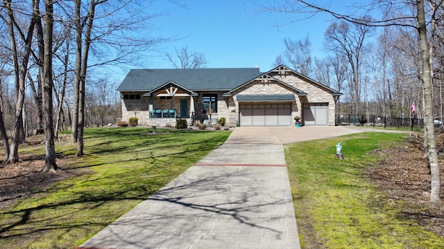 13966 346th Ct, Lindstrom, MN 55045 - craftsman-style house with a front yard, fence, concrete driveway, an attached garage, and stone siding