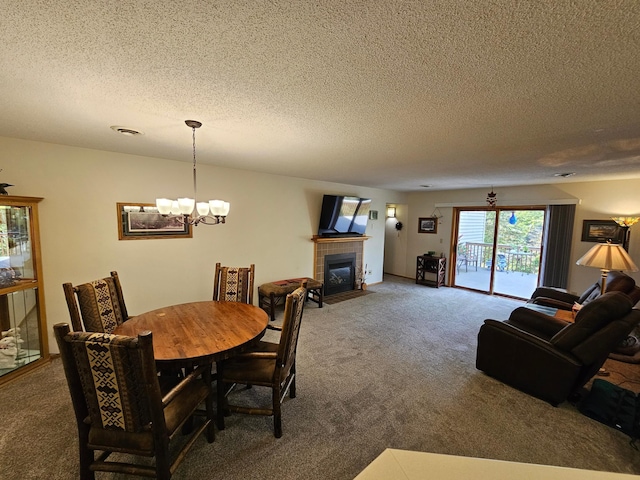 21965 Shady Walk Unit 201, Deerwood, MN 56444 - carpeted dining area featuring a chandelier, a textured ceiling, and a tile fireplace