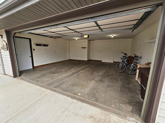 21965 Shady Walk Unit 201, Deerwood, MN 56444 - garage featuring a garage door opener