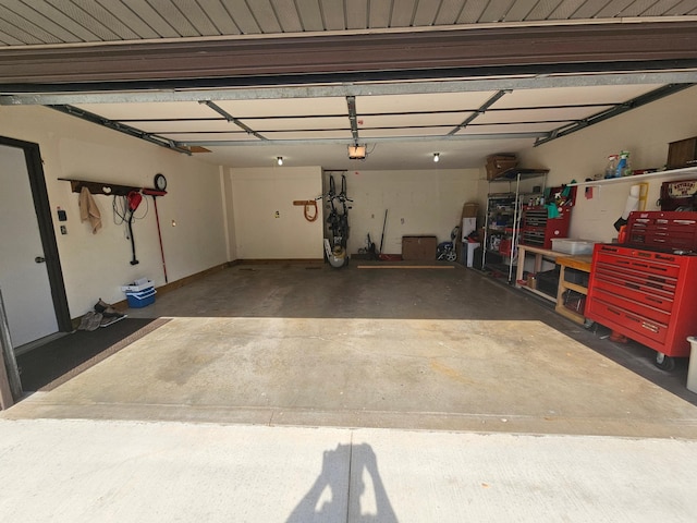 21965 Shady Walk Unit 201, Deerwood, MN 56444 - garage featuring a garage door opener