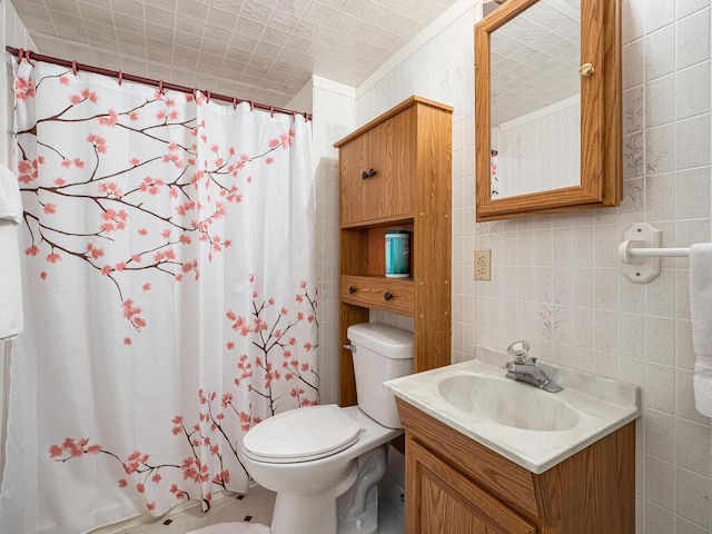 15722 Griffon Ct, Apple Valley, MN 55124 - bathroom with tile walls, toilet, vanity, and a shower with curtain