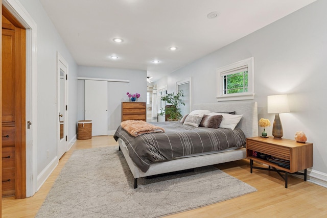 1295 Fairmount Ave, Saint Paul, MN 55105 - bedroom featuring light wood-style floors, recessed lighting, and a closet