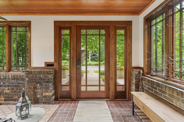 1295 Fairmount Ave, Saint Paul, MN 55105 - doorway featuring wooden ceiling, plenty of natural light, wainscoting, and brick flooring