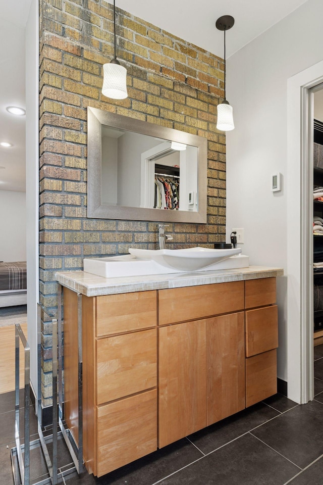 1295 Fairmount Ave, Saint Paul, MN 55105 - full bath featuring vanity, a walk in closet, tile patterned flooring, and ensuite bathroom