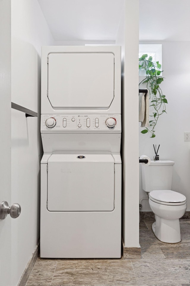 1295 Fairmount Ave, Saint Paul, MN 55105 - laundry area featuring stacked washer / drying machine