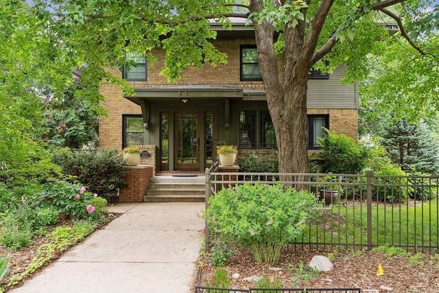 1295 Fairmount Ave, Saint Paul, MN 55105 - view of front facade featuring brick siding and covered porch