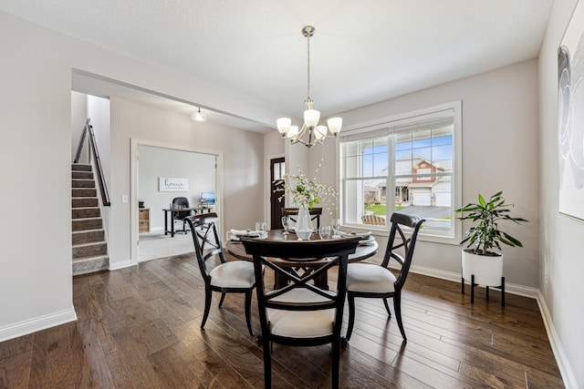 dining space with stairs, baseboards, a notable chandelier, and dark wood-style floors
