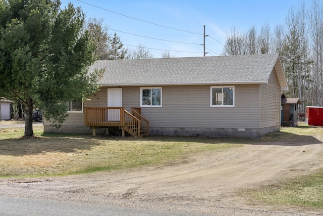 ranch-style house featuring crawl space, roof with shingles, and dirt driveway