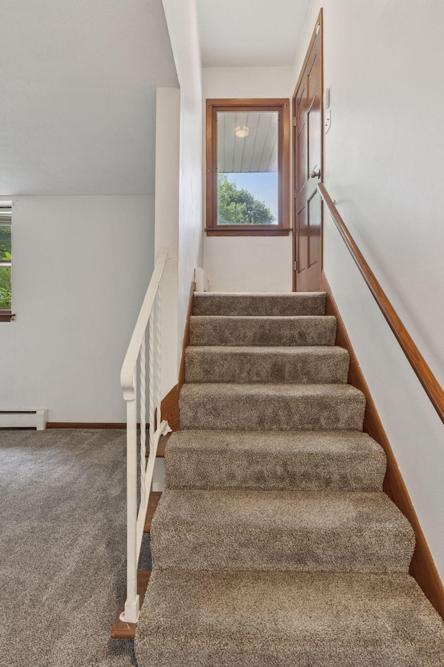 84 Logan Ave W, West Saint Paul, MN 55118 - staircase with a baseboard radiator, healthy amount of natural light, and carpet
