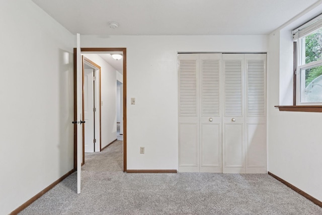 84 Logan Ave W, West Saint Paul, MN 55118 - unfurnished bedroom with carpet flooring and a closet