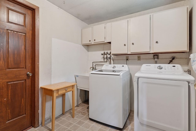 84 Logan Ave W, West Saint Paul, MN 55118 - washroom with separate washer and dryer, cabinet space, and light floors