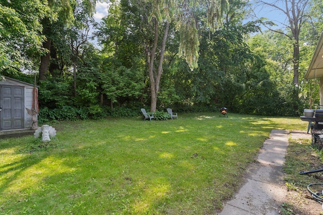 84 Logan Ave W, West Saint Paul, MN 55118 - view of grassy yard with a storage unit