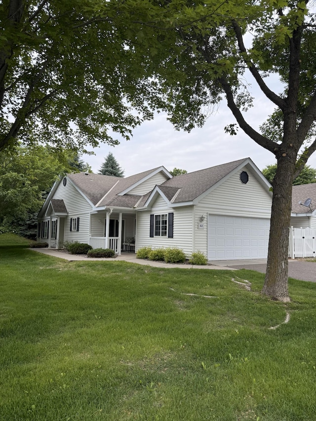 3621 Lansing Ave NE, Saint Michael, MN 55376 - single story home featuring covered porch, a garage, driveway, and roof with shingles