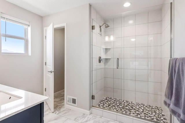full bath featuring a shower stall, visible vents, and marble finish floor