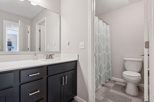 18522 60th Ave N, Plymouth, MN 55446 - full bath featuring vanity, baseboards, toilet, and a shower with shower curtain