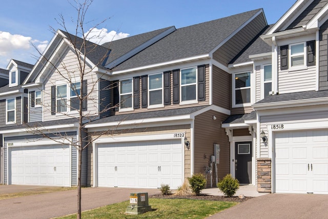 18522 60th Ave N, Plymouth, MN 55446 - townhome / multi-family property with a garage and a shingled roof