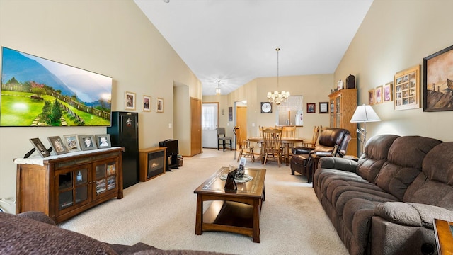 112 Sandpiper Cir, Hastings, MN 55033 - living area featuring a chandelier, light carpet, and high vaulted ceiling
