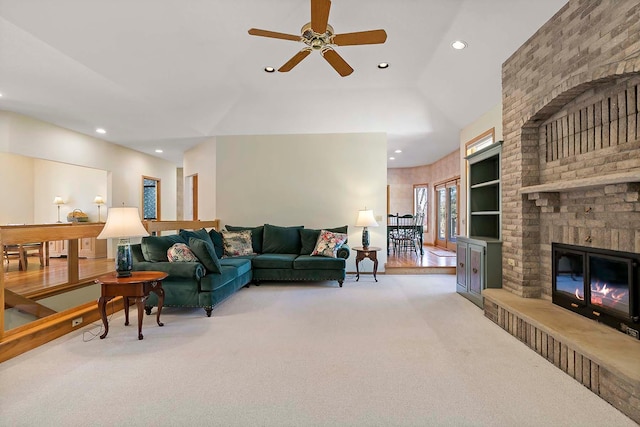 3931 Crestview Dr, Chanhassen, MN 55331 - living area featuring light colored carpet, a fireplace, recessed lighting, ceiling fan, and built in features