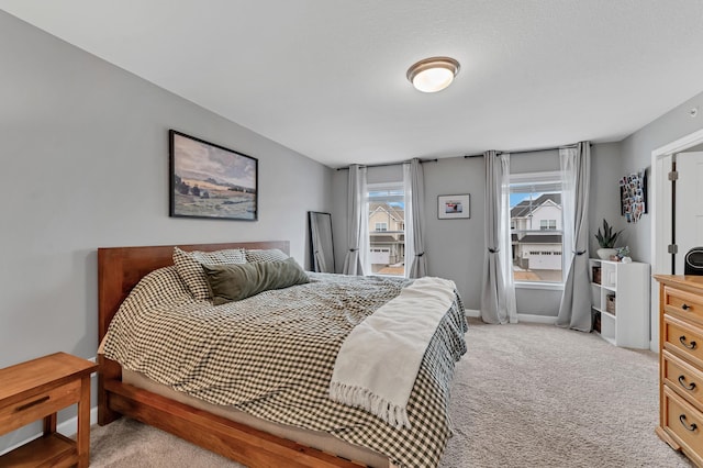 22962 Hazel Ln, Rogers, MN 55374 - bedroom featuring light colored carpet and baseboards