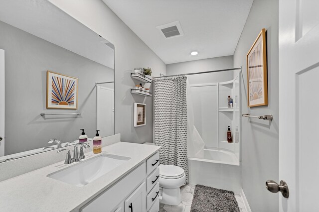 22962 Hazel Ln, Rogers, MN 55374 - bathroom featuring vanity, toilet, shower / bath combo, and marble finish floors