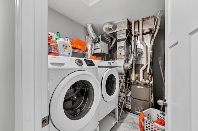 22962 Hazel Ln, Rogers, MN 55374 - laundry room with washing machine and clothes dryer and marble finish floors