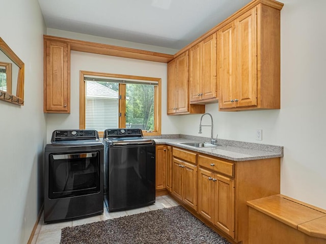 1844 Red Fox Rd, Eagan, MN 55122 - laundry area with washer and clothes dryer, cabinet space, and light tile patterned floors