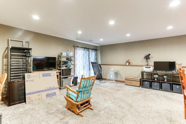 sitting room with carpet flooring and recessed lighting