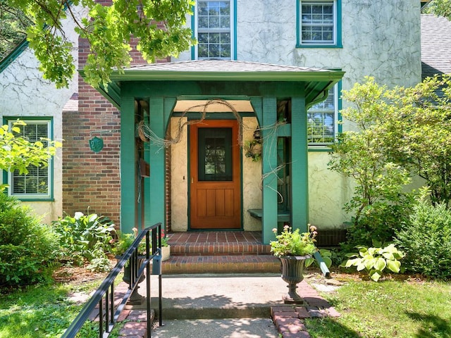 25 Benhill Rd, Saint Paul, MN 55105 - doorway to property with stucco siding and brick siding