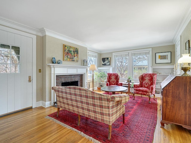 25 Benhill Rd, Saint Paul, MN 55105 - living area with wood-type flooring, plenty of natural light, a fireplace, and ornamental molding