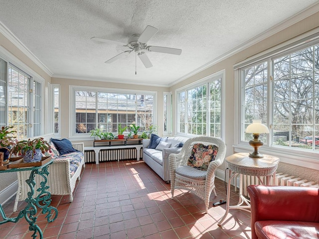 25 Benhill Rd, Saint Paul, MN 55105 - sunroom with tile patterned floors, ornamental molding, a textured ceiling, and radiator