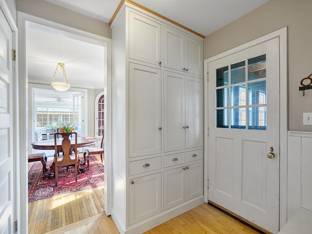 25 Benhill Rd, Saint Paul, MN 55105 - foyer entrance featuring light wood-style floors and ornamental molding