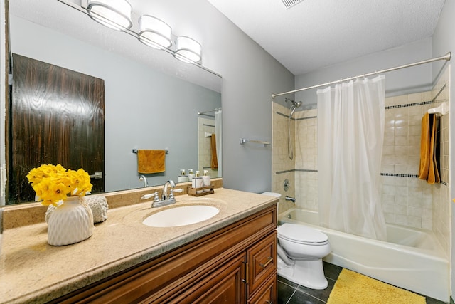 436 Bruns Ct, Vadnais Heights, MN 55127 - bathroom featuring shower / bath combo, tile patterned floors, toilet, vanity, and a textured ceiling
