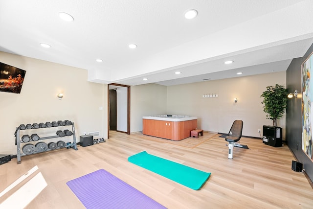 436 Bruns Ct, Vadnais Heights, MN 55127 - workout area with light wood-style flooring, recessed lighting, and baseboards